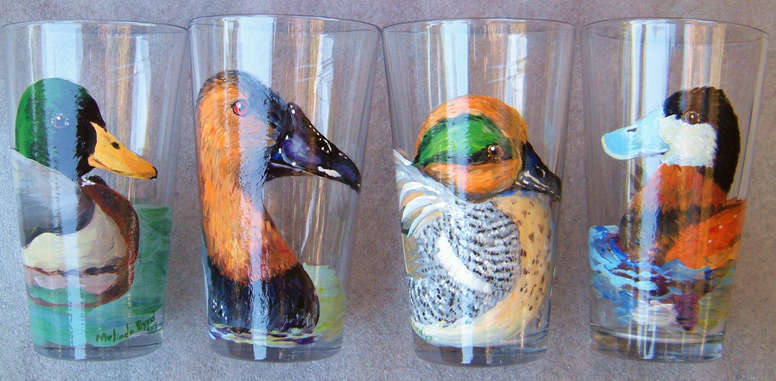 ducks hand-painted on pint glasses